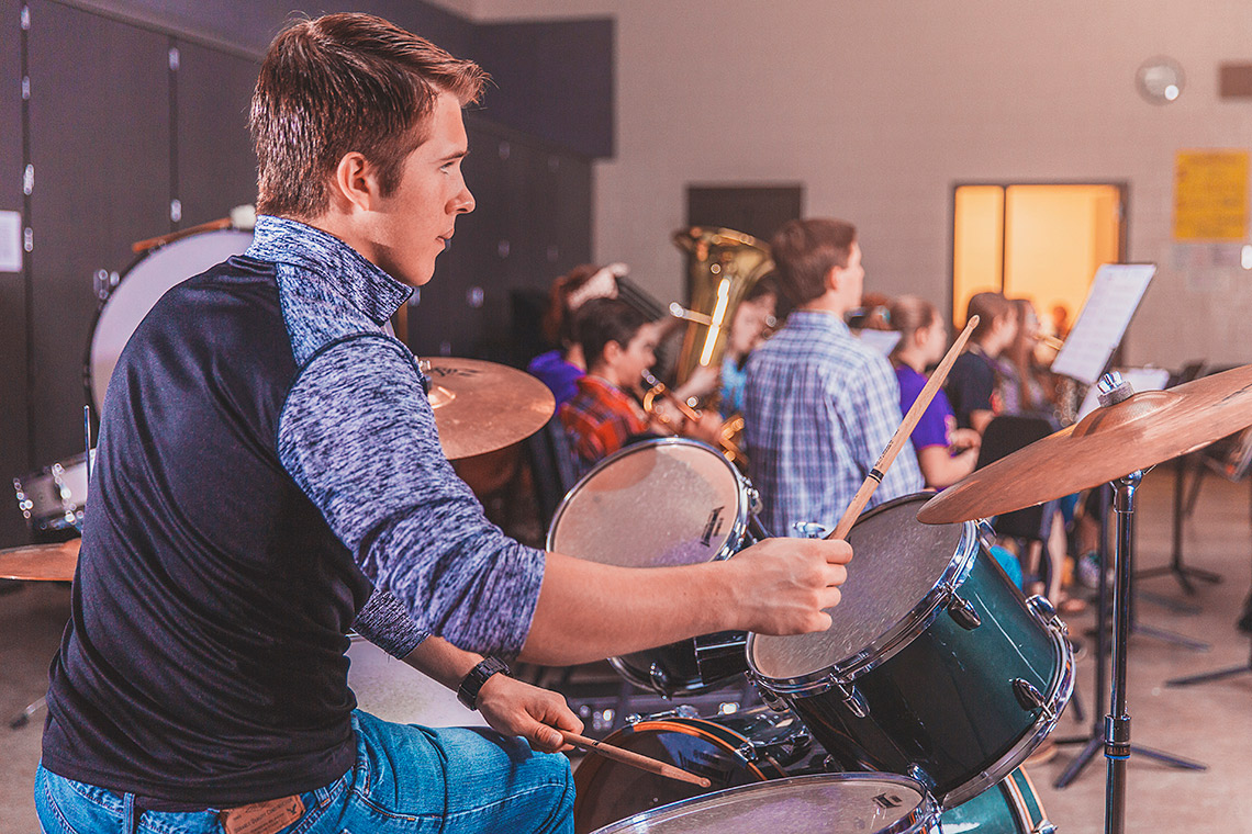 Calvin playing drums